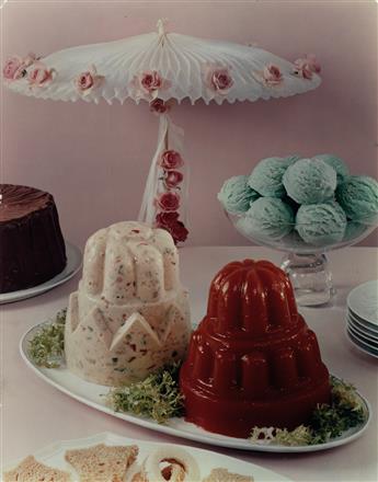 (FOOD) Group of 25 vivid color photographs of mid-20th-century table spreads and themed meals.